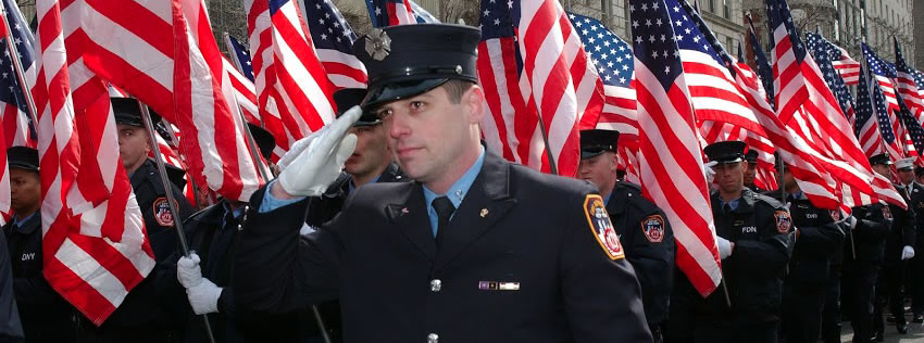 Man in uniform saluting the flag