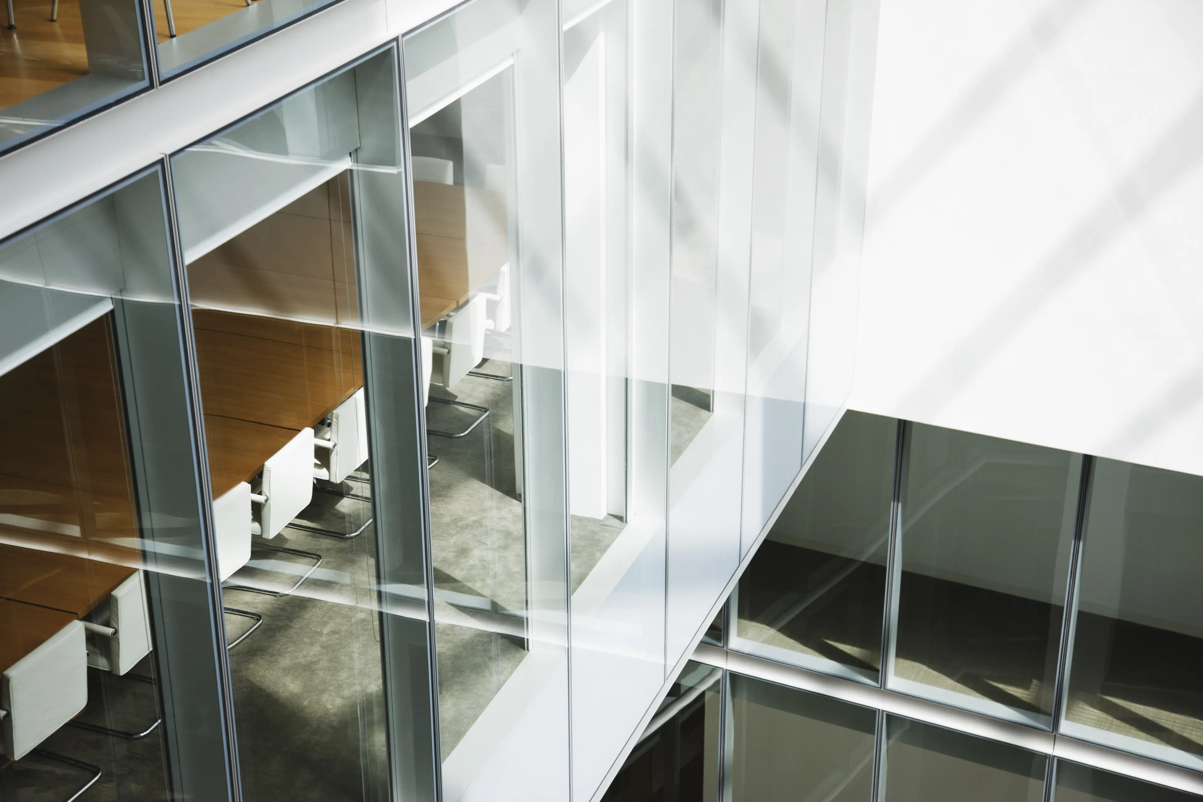 Glass-walls-in-atrium-of-office-building