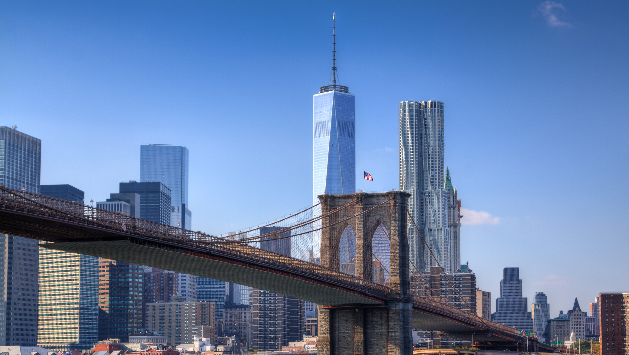 Brooklyn Bridge, New York City Skyline and World Trade Center.